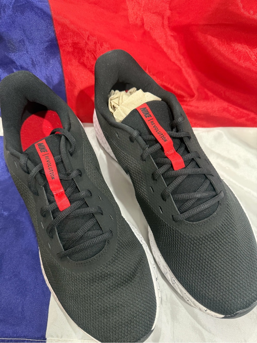 Nike Men's Black Athletic Shoes with Red Tongue Accent